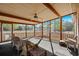 Relaxing screened porch with wicker furniture and a view of the serene backyard at 2531 Smiley Ln., Conway, SC 29526