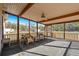 Inviting screened porch featuring wicker furniture and an open view of the backyard at 2531 Smiley Ln., Conway, SC 29526