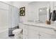 Well-lit bathroom with a shower, granite countertop vanity, and decorative accents at 2539 Blue Crane Circle # 101, Myrtle Beach, SC 29577