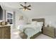 Bright bedroom with ample sunlight, a ceiling fan, and coordinated furniture for a tranquil retreat at 2539 Blue Crane Circle # 101, Myrtle Beach, SC 29577