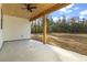 Covered patio with wood ceiling and view of backyard at 270 Russ Rd., Loris, SC 29569