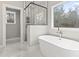 Elegant bathroom with soaking tub and walk-in shower at 270 Russ Rd., Loris, SC 29569