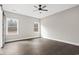 Bright bedroom with two windows and ceiling fan at 270 Russ Rd., Loris, SC 29569