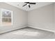 Spacious bedroom featuring a ceiling fan and window at 270 Russ Rd., Loris, SC 29569