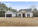 Two-story craftsman home with attached garage at 270 Russ Rd., Loris, SC 29569