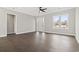 Bright and airy living room featuring dark hardwood floors and ample natural light at 270 Russ Rd., Loris, SC 29569