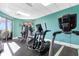 Bright gym with modern equipment and large windows overlooking the surrounding greenery at 2700 N Ocean Blvd. # 253, Myrtle Beach, SC 29577