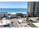 Aerial view of a beautiful condo complex near the beach with ocean views and a light color scheme at 3701 S Ocean Blvd. S # 206, North Myrtle Beach, SC 29582