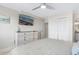 Relaxing bedroom with light-colored decor, ample storage, and a modern ceiling fan for a serene coastal vibe at 3701 S Ocean Blvd. S # 206, North Myrtle Beach, SC 29582