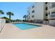 Inviting outdoor pool area with plenty of lounge chairs, perfect for relaxation and enjoying the coastal sunshine at 3701 S Ocean Blvd. S # 206, North Myrtle Beach, SC 29582