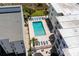 Aerial shot of a well-maintained pool area surrounded by lounge chairs, offering a relaxing outdoor space at 3701 S Ocean Blvd. S # 206, North Myrtle Beach, SC 29582