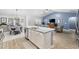 Modern kitchen seamlessly connecting to the living area with a dining area, great for entertaining at 3713 Park Pointe Ave., Little River, SC 29566