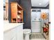 Modern bathroom with dark walls, tiled floors, glass shower and a white vanity at 3931 East Glades Dr., Myrtle Beach, SC 29588