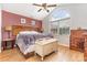 Comfortable bedroom featuring a high ceiling, natural light, and wooden accents at 3931 East Glades Dr., Myrtle Beach, SC 29588