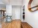 Hallway featuring hardwood floors, decorative console table, and access to other rooms in the house at 3931 East Glades Dr., Myrtle Beach, SC 29588