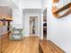 Hallway featuring hardwood floors, decorative console table, and access to other rooms in the house at 3931 East Glades Dr., Myrtle Beach, SC 29588