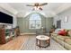 Cozy living room with vaulted ceilings, ample natural light, comfortable seating, and a stylish rug at 3931 East Glades Dr., Myrtle Beach, SC 29588