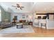 Living room featuring hardwood floors, comfortable seating, and an open concept design at 3931 East Glades Dr., Myrtle Beach, SC 29588