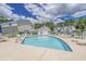 Community pool with lounge chairs and patio tables at 3983 Tybre Downs Circle # 3983, Little River, SC 29566