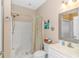 Bathroom with a shower, white vanity, and coastal decor at 4142 Hibiscus Dr. # 101, Little River, SC 29566