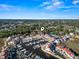 Stunning aerial view of the community featuring a marina, pool, and charming red-roofed townhomes at 4396 Baldwin Ave. # 94, Little River, SC 29566