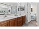 Bright bathroom features a dual sink vanity with generous counter space and a separate door to the toilet and bathtub at 4396 Baldwin Ave. # 94, Little River, SC 29566