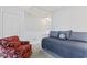 A loft with daybed and chair offer additional space for activities at 4396 Baldwin Ave. # 94, Little River, SC 29566