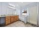 Bathroom with a double vanity, tile floor, separate shower, and large soaking tub at 455 Blackberry Ln., Myrtle Beach, SC 29579