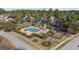 Aerial shot of the community pool, cabana, playground and surrounding landscaping at 455 Blackberry Ln., Myrtle Beach, SC 29579