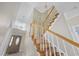 Staircase leads to the front door featuring wooden stairs and white wood railing at 455 Blackberry Ln., Myrtle Beach, SC 29579