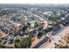 Aerial view of a well-planned community featuring single-Gathering homes, lush landscaping, and a central community pool at 4783 Southgate Pkwy., Myrtle Beach, SC 29579