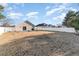 Expansive backyard featuring a white fence, providing privacy and space for various outdoor activities at 4783 Southgate Pkwy., Myrtle Beach, SC 29579