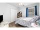 Comfortable bedroom featuring a closet, dresser, and natural light at 4783 Southgate Pkwy., Myrtle Beach, SC 29579