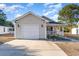 Charming single-story home featuring an attached garage and a well-maintained front yard at 4783 Southgate Pkwy., Myrtle Beach, SC 29579