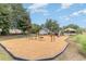 Community playground with swings, slides, and a bench, perfect for Gathering fun and recreation at 4783 Southgate Pkwy., Myrtle Beach, SC 29579