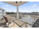 Balcony with chairs and a view of the lake and surrounding community at 4851 Luster Leaf Circle # 302, Myrtle Beach, SC 29577