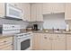 Well-lit kitchen featuring modern appliances, plenty of cabinet space, and a functional layout at 4851 Luster Leaf Circle # 302, Myrtle Beach, SC 29577