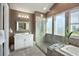 Bathroom featuring a large soaking tub and a glass shower at 4904 Salt Creek Ct., North Myrtle Beach, SC 29582