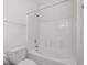 Clean bathroom with a bright white tub and shower at 4933 Crab Pond Ct. # 202, Myrtle Beach, SC 29579