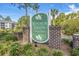 Windsor Green at Waterford Plantation community sign featuring detailed brick columns and lush landscaping at 4933 Crab Pond Ct. # 202, Myrtle Beach, SC 29579