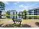 Scenic view of the buildings overlooking a peaceful pond at 4933 Crab Pond Ct. # 202, Myrtle Beach, SC 29579