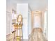 Hallway with a light-colored wood floor and a view of the kitchen at 5001 Little River Rd. # W-214, Myrtle Beach, SC 29577