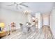 Bright living room with dining area and light wood-look floors at 5001 Little River Rd. # W-214, Myrtle Beach, SC 29577