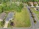 Aerial view of a property showcasing its landscaped lot, and proximity to neighboring homes in a quiet neighborhood at 600 Barona Dr., Myrtle Beach, SC 29579