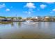 Attractive waterfront view with charming homes and a central fountain at 6001-6012 S Kings Hwy., Myrtle Beach, SC 29575