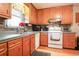 Functional kitchen featuring wood cabinets and modern appliances at 604 Six Lakes Dr., Myrtle Beach, SC 29588