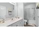 Well-lit bathroom featuring a vanity with a large mirror and a shower-tub combination at 6208 Sweetwater Blvd. # 6208, Murrells Inlet, SC 29576