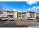 Exterior shot of condominium complex with screened porches, balconies, and ample parking at 6208 Sweetwater Blvd. # 6208, Murrells Inlet, SC 29576