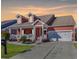 Inviting single-Gathering home boasting a charming front porch and attached two-car garage at 644 Serendipity Circle, Murrells Inlet, SC 29576