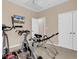 A small room being used as a gym featuring exercise bike and inversion table at 644 Serendipity Circle, Murrells Inlet, SC 29576